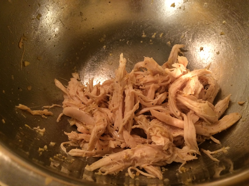 Shredded chicken mixed with garlic, salt, sesame oil, and pepper
