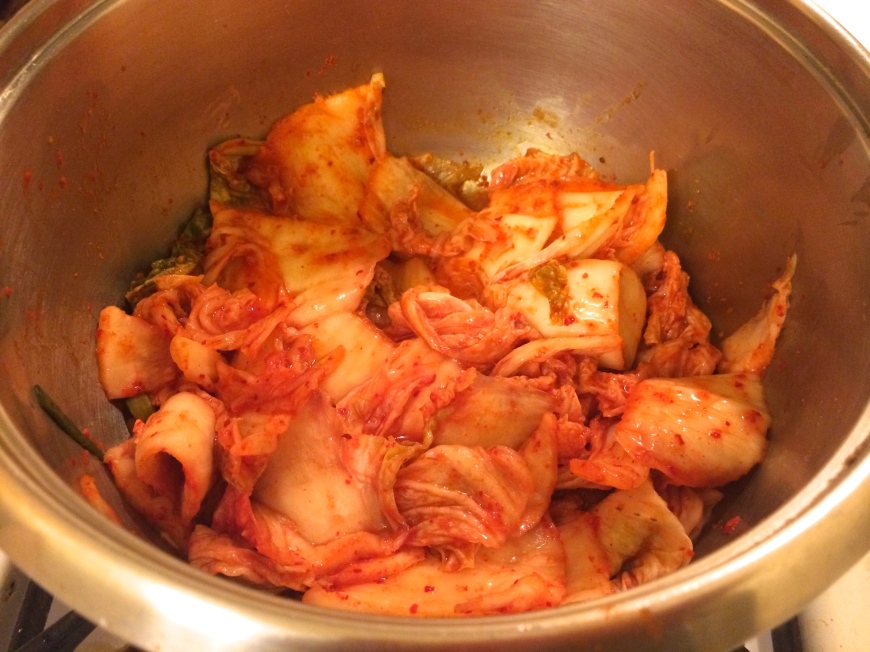 Frying kimchi with sesame oil 